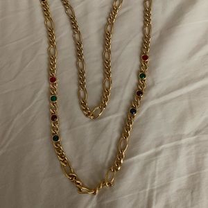 Gold tone necklace with colored stones inset